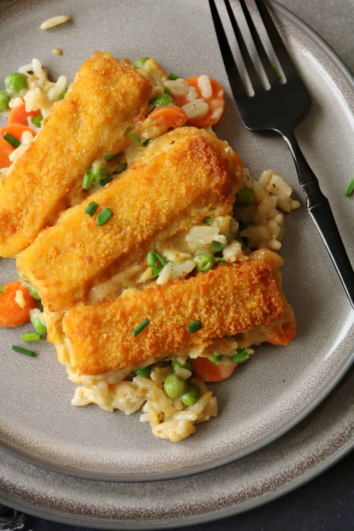 A close-up of a plate of fish finger pie.