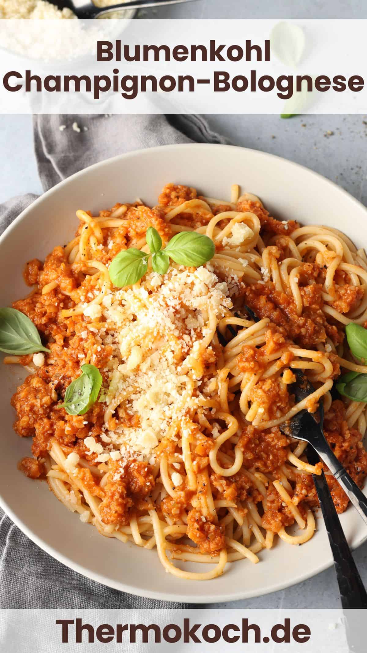 A white plate of cauliflower mushroom Bolognese served over spaghetti.