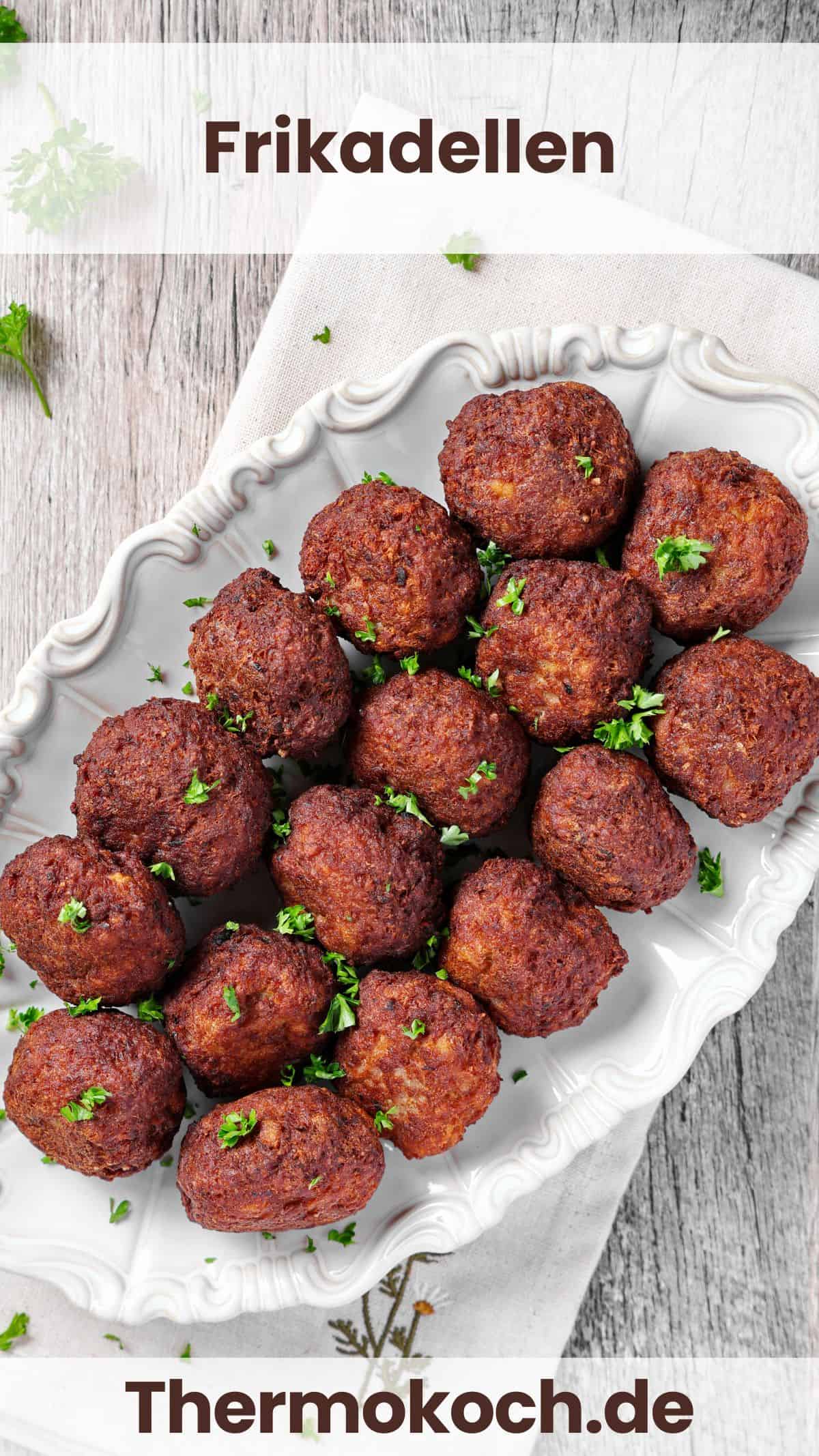 A white serving platter with meatballs.