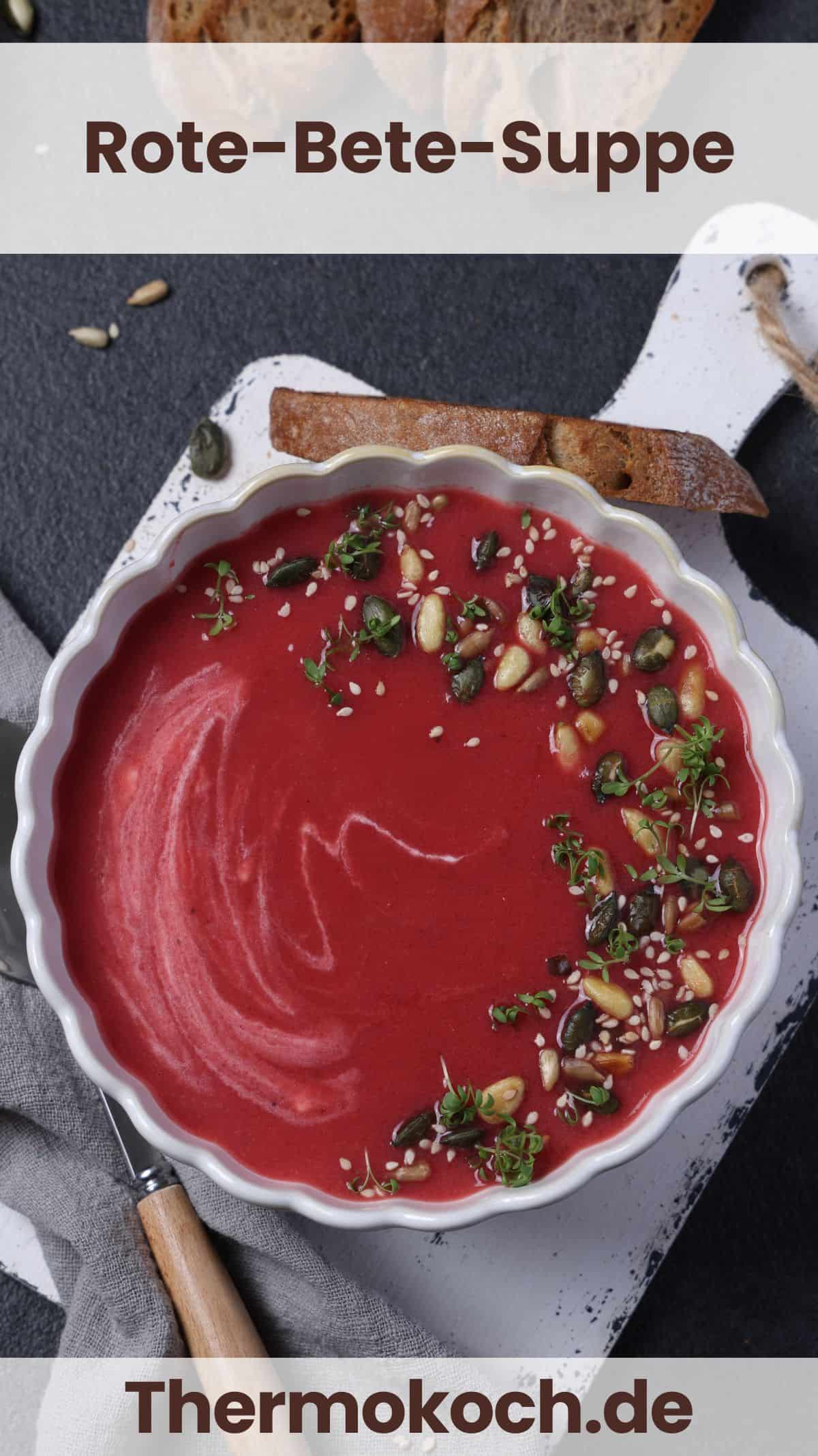 A bowl of beet soup garnished with pine nuts, sunflower seeds, and fresh cress.