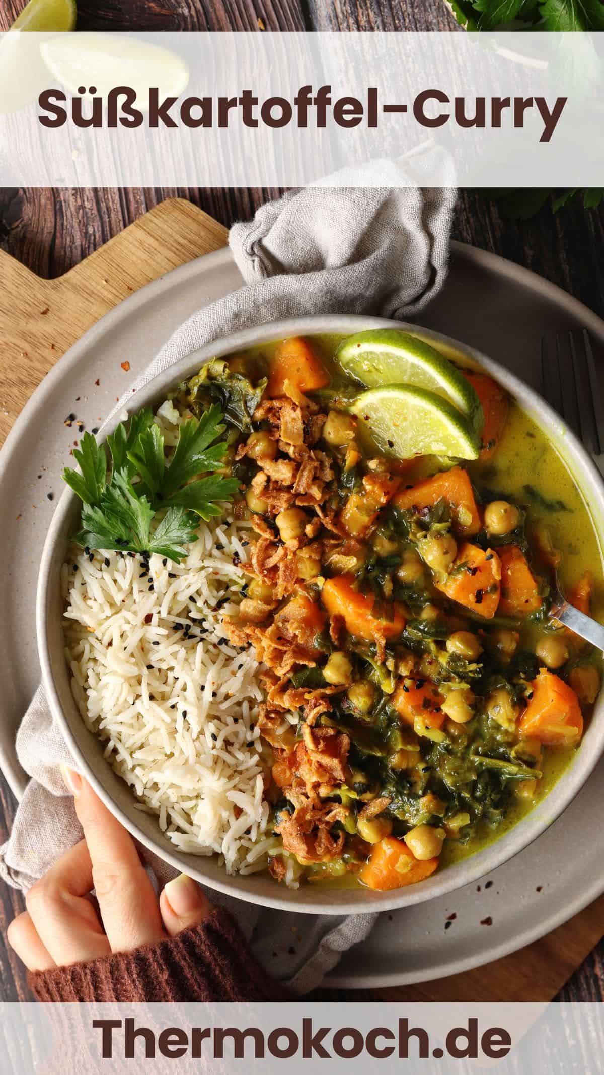 A deep bowl filled with sweet potato curry, spinach, chickpeas, served with rice and lemon wedges.
