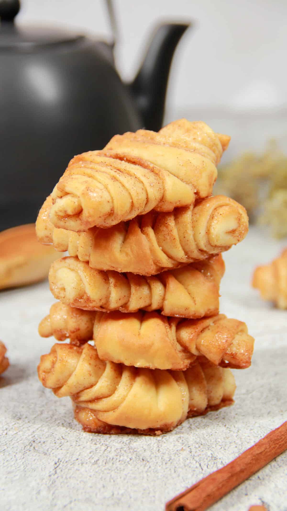 A small stack of mini Franzbrötchen pastries.