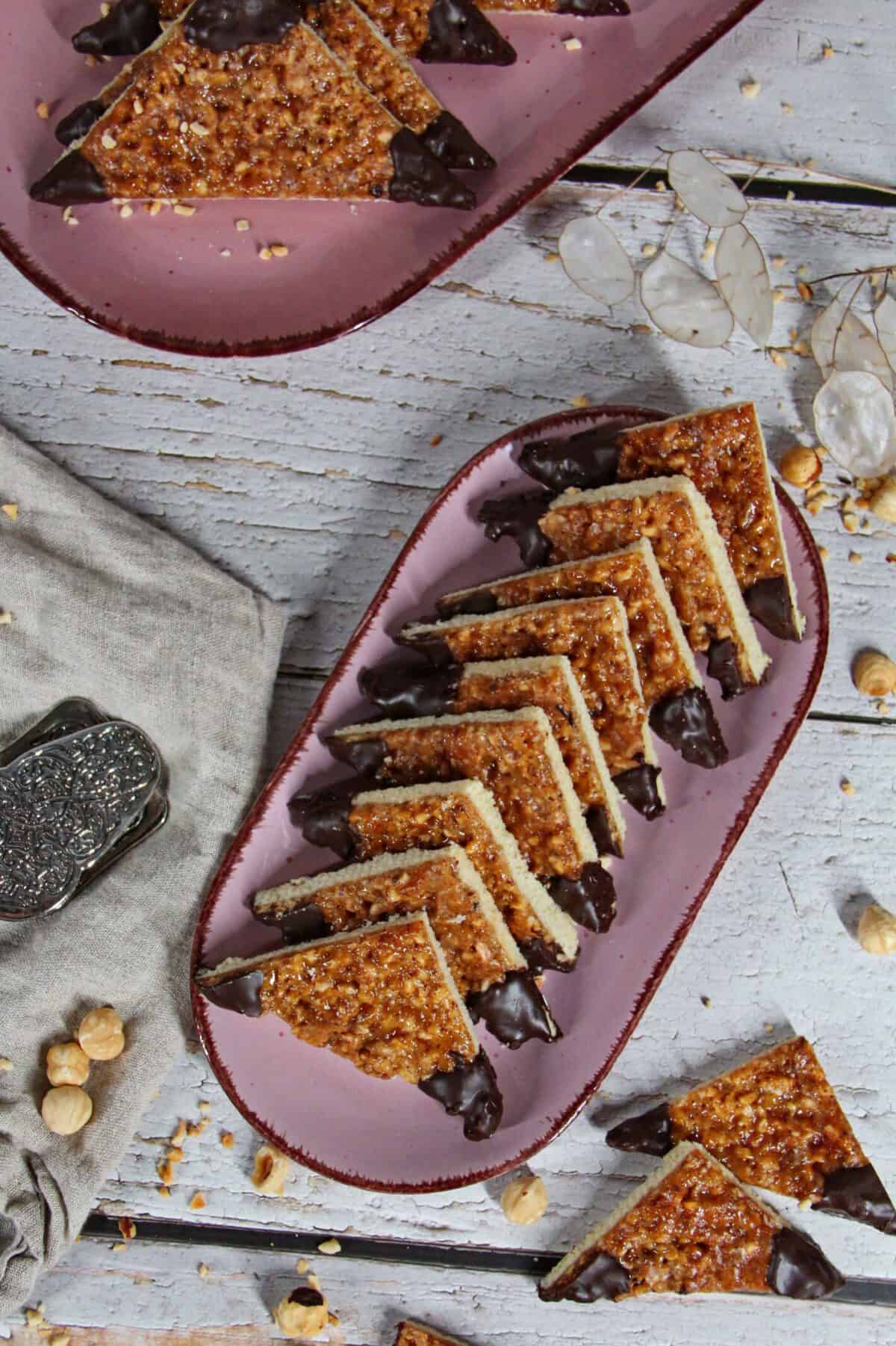 German nut bars lined up on a serving platter.